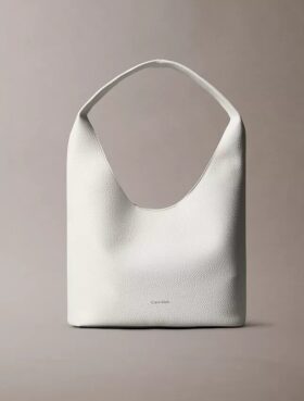 Mala folgada com textura granulada Mala folgada com textura granulada