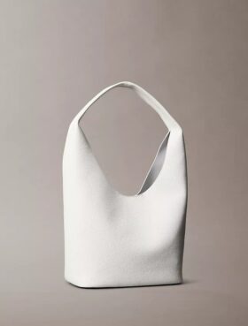 Mala folgada com textura granulada Mala folgada com textura granulada