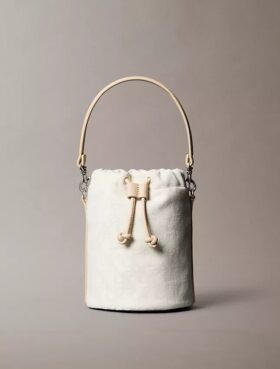 Mala tipo balde com Monogram em toda a superfície