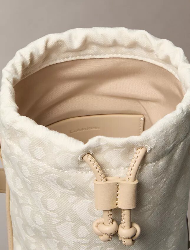 Mala tipo balde com Monogram em toda a superfície Mala tipo balde com Monogram em toda a superfície