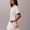 Mala tipo balde com Monogram em toda a superfície Mala tipo balde com Monogram em toda a superfície