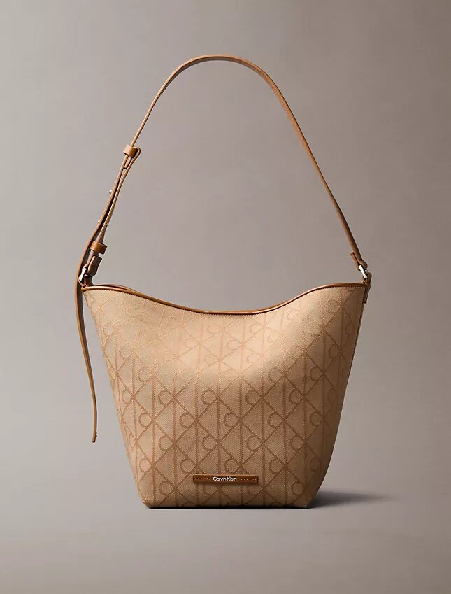 Mala tipo balde em jacquard com logótipo em todo o tecido e bolsa interior Mala tipo balde em jacquard com logótipo em todo o tecido e bolsa interior