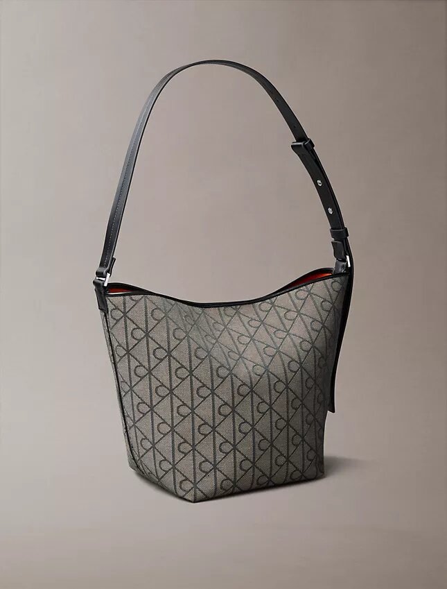 Mala tipo balde em jacquard com logótipo em todo o tecido e bolsa interior Mala tipo balde em jacquard com logótipo em todo o tecido e bolsa interior