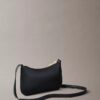 Mini-bolsa com Monogram arrojado Mini-bolsa com Monogram arrojado
