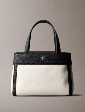 Mini-bolsa transversal em lona Monogram