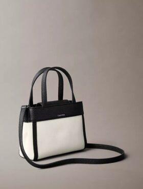 Mini-bolsa transversal em lona Monogram