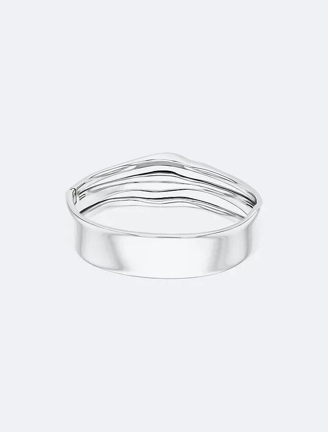 Pulseira articulada com forma fluida e escultural Pulseira articulada com forma fluida e escultural