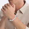 Pulseira com contas de forma retangular orgânica