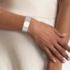 Relógio com mostrador geométrico e bracelete em malha Relógio com mostrador geométrico e bracelete em malha
