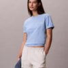 T-shirt Boxy com grafismo Calvin Klein em letra cursiva T-shirt Boxy com grafismo Calvin Klein em letra cursiva