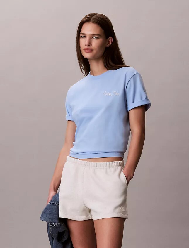 T-shirt Boxy com grafismo Calvin Klein em letra cursiva T-shirt Boxy com grafismo Calvin Klein em letra cursiva
