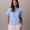 T-shirt Boxy com grafismo Calvin Klein em letra cursiva T-shirt Boxy com grafismo Calvin Klein em letra cursiva