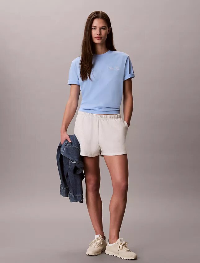 T-shirt Boxy com grafismo Calvin Klein em letra cursiva T-shirt Boxy com grafismo Calvin Klein em letra cursiva