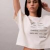 T-shirt Boxy com logótipo em tipo de letra gráfico T-shirt Boxy com logótipo em tipo de letra gráfico