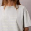 T-shirt Boxy com logótipo em tipo de letra gráfico T-shirt Boxy com logótipo em tipo de letra gráfico