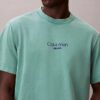 T-shirt clássica com logótipo e efeito de lavagem ácida T-shirt clássica com logótipo e efeito de lavagem ácida