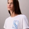 T-shirt curta e larga com logótipo em letra cursiva T-shirt curta e larga com logótipo em letra cursiva