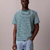 T-shirt de corte descontraído com riscas T-shirt de corte descontraído com riscas
