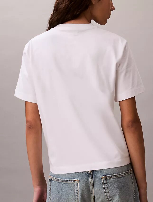 T-shirt de gola redonda com corte largo e logótipo padrão T-shirt de gola redonda com corte largo e logótipo padrão