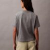 T-shirt de gola redonda com corte largo e logótipo padrão T-shirt de gola redonda com corte largo e logótipo padrão