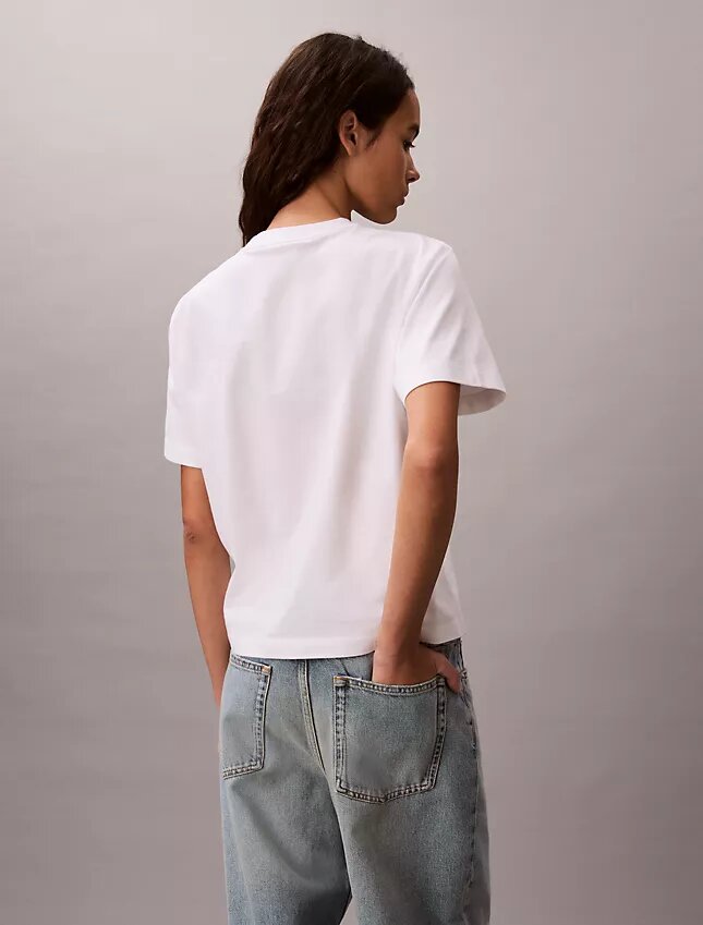 T-shirt de gola redonda com corte largo e logótipo padrão T-shirt de gola redonda com corte largo e logótipo padrão