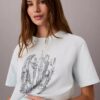 T-shirt de gola redonda com grafismo de paisagem urbana
