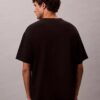 T-shirt de gola redonda descontraída com logótipo de arquivo T-shirt de gola redonda descontraída com logótipo de arquivo