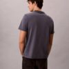 T-shirt Monologo com lavagem ácida T-shirt Monologo com lavagem ácida