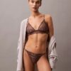 Thong CK Black com renda floral preta Thong CK Black com renda floral preta