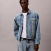 Trucker Jacket em Denim dos anos 90 com Monogram em toda a peça Trucker Jacket em Denim dos anos 90 com Monogram em toda a peça