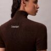 Vestido de malha com canelado em mistura de lã merino e lurex Vestido de malha com canelado em mistura de lã merino e lurex